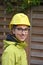 Female trainee with yellow security helmet