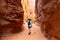 Female Traveler in Fiery Furnace Trail in Utah