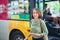 Female traveler going off the bus at terminal