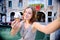 Female traveler making selfie photo with traditional italian ice cream in Venice