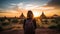 Female traveler photographing temples at Bagan Myanmar Asia at sunrise