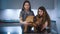 Female vet and nurse examining dog on the examination table