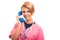 Female vet wearing pink scrub talking on blue receiver