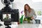 Female Vlogger Making Social Media Video About Houseplant Care For The Internet