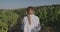 Female walking in a vineyard in Serbia