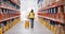 Female warehouse worker walking with mop and bucket