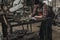 female welder doing paperwork at table