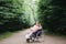 Female wheelchair user posing at summer park