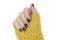 Female woman hands in yellow sweater with fresh polished red nails, autumn winter Christmas New Year manicure at nail