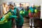 Female worker arranging lettuce in boxes at vegetable sorting factory