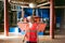 Female worker on beer factory. portrait woman in robe, standing on background line Food production, Inspection management control