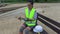 Female worker with drone on wooden pier