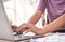 Female worker hand typing using Computer laptop