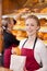 Female Worker Packing Breads In Bakery