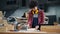 Female worker polishing timber beam in wood workshop using manual abrasive block