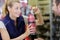 Female worker in store that sells fire extinguishers