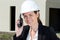 female worker talks on walkie-talkie outdoors