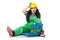 Female workman in green overalls with tool kit