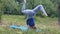Female yogi balancing standing on fore arms, advanced asana, experienced yoga
