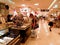 Female young tourist buying jewelry in luxurious shop in Ginza, the most luxurious and fancy place to shop in Tokyo, Japan.