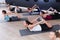 Females exercising during yoga class