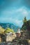 Feminine young romantic woman walking in Old Bar, Montenegro. Brunette female with long hair posing on ancient ruins