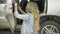 feminized girl master service the blonde working on the old car in to the mechanic for repair