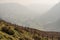 Fence besides misty valley in North Wales