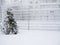 Fence covered with snow. Snow-covered lattice.