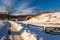 Fence and farm field along a snow-covered road in Seven Valleys, Pennsylvania.