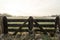 Fence in frozen polder landscape in The Netherlands