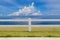 The fence on grassland and cloud blue sky