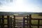 Fence and kissing gate in a rural landscape