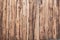 Fence made vertical wooden planks, pine wood, pipe texture surface, vintage background with place for text, poorly processed