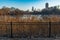 Fence with Native Prairie Grass surrounding North Pond in Lincoln Park Chicago with the Skyline