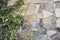 Fence of ornamental stone, ray background stylized in a natural wild stone