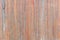 Fence vertical bars. Background of thin wooden boards.