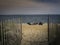 Fenced Beach Entrance to the Sea and Beach Chairs on Cape Cod