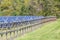 Fenced in ground mount solar power farm