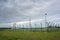 Fenced Landfall station of nord stream 2 in Lubmin near Greifswald under a cloudy sky, gas pipeline through the Baltic Sea from