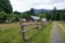 Fenceline along a driveway leading to a valley farmstead