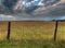 Fenceline and Dramatic Clouds