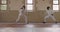 Fencer athletes during a fencing training in a gym
