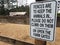 Fences are to keep the animals in please do not climb on them or open the farm gates sign