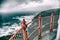 Fences on top of a lighthouse, stormy weather coming