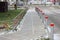 Fencing of the sidewalk from cars several metal posts, antiterrorist protection