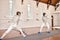 Fencing, sport and men with sword to fight in training, exercise or workout in a hall. Martial arts, match and fencers