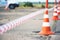 Fencing tape and road cone