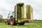 Fendt green tractor with claas mowers in silage field