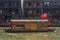 FENGHUANG, CHINA - AUGUST 14, 2018: Boat with hammer and sickle flag on Tuo river in Fenghuang Ancient City, Hunan